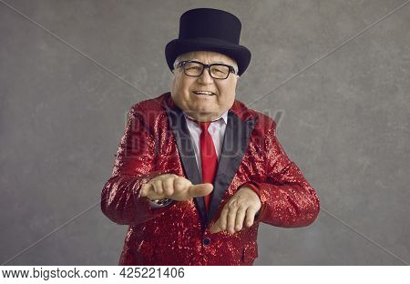 Funny Fat Senior Man In A Red Sequin Jacket Having Fun At A Crazy Retro Disco Party