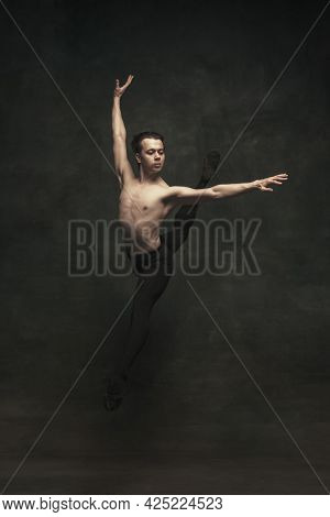 Young And Graceful Male Ballet Dancer Isolated On Dark Background. Art, Action, Inspiration Concept.