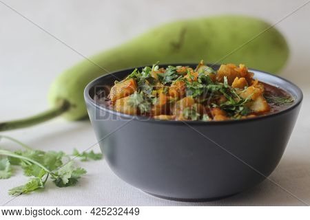Bottle Gourd Curry With Lentils. One Pot Chickpea Lentil Dish Cooked With Bottle Gourd Onions Tomato