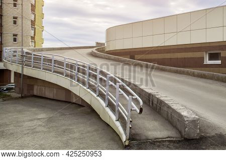 The Road To The Second Floor Of The Parking Lot Meanders.
