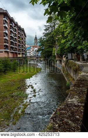 Traditional Houses In The Town Of Azkoitia Next To The Urola River And Church Of Santa María La Real