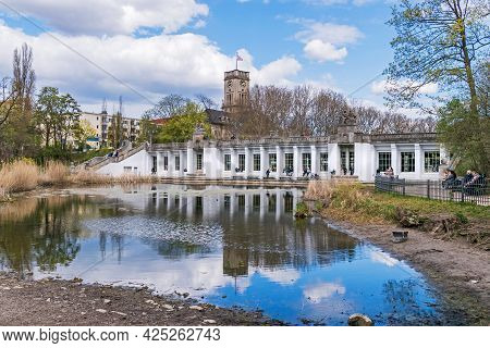 Berlin, Germany - April 25, 2021: Garden Monument Rudolph Wilde Park With The Duck Pond And The Carl