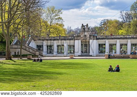 Berlin, Germany - April 25, 2021: Playgrounds Of The Garden Monument Rudolph Wilde Park And The Arch