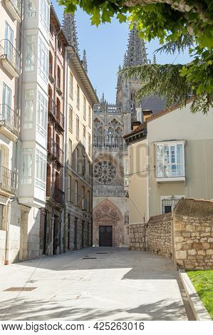 Burgos, Spain - June 29, 2021: View Of The Spires Of The Facade Of The Cathedral Of Burgos Behind So