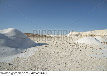Beautiful Lunar Landscape. Wight And Smooth Hills In Various Shapes In A Desert Landscape. The Whiti
