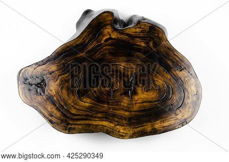 Cross Section Of The Tree. Saw Cut From A Tree Trunk. Wooden Surface. Cracks. On White Background.