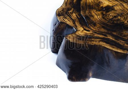 Cross Section Of The Tree. Saw Cut From A Tree Trunk. Wooden Surface. Cracks. On White Background.