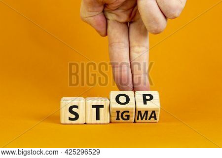 Stop Stigma Symbol. Doctor Turns Cubes With Words Stop Stigma. Beautiful Orange Background. Medical 