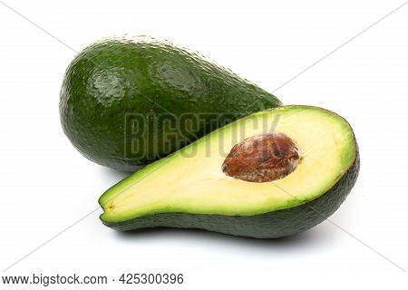 Avocado Whole Fruit And Slices, Isolated On A White Background