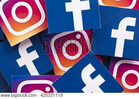 London, Uk - June 2021: Facebook And Instagrm Logos Printed Onto Paper