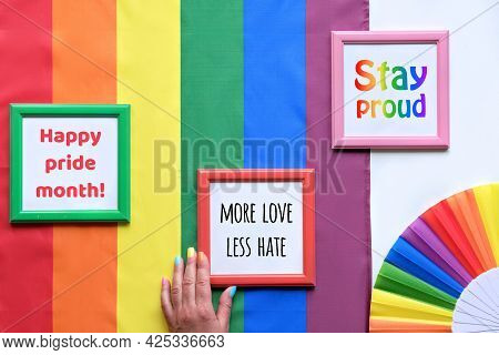 Rainbow Lgbt Flag Background With Frames, Fan. Text Love Is Love, Stay Proud And Happy Pride Month. 