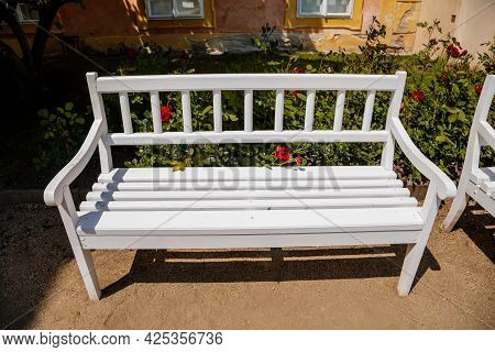 Krasny Dvur Chateau, North Bohemia, Czech Republic, 19 June 2021: White Bench On Sunny Summer Day Ne