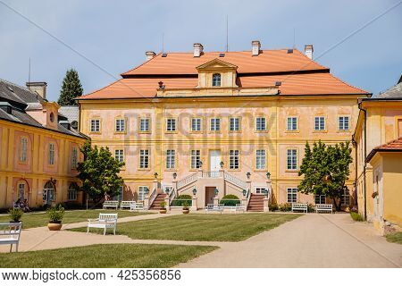 Krasny Dvur Chateau, North Bohemia, Czech Republic, 19 June 2021: Baroque Yellow Castle With Stairs,