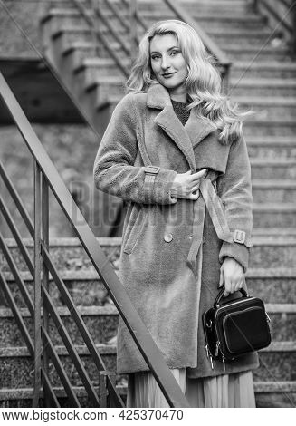 Any Weather Is Good. Autumn Season. European Winter. Girl Warm Coat Stairs Background. Faux Fur Coat