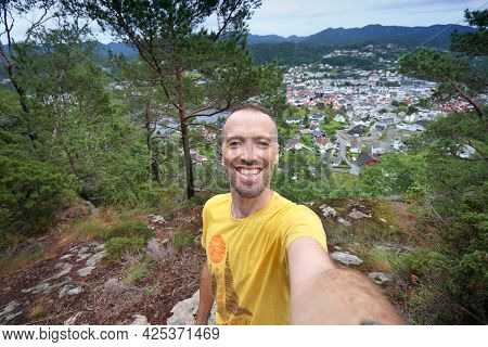 Traveler Selfie In Norway Hiking Area - Mountain Trail Above Town Of Flekkefjord. Outdoor Recreation