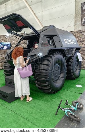 Wheeled All-terrain Vehicle. Visitors Watch The Nomad All-terrain Vehicle At Arms And Security - 202