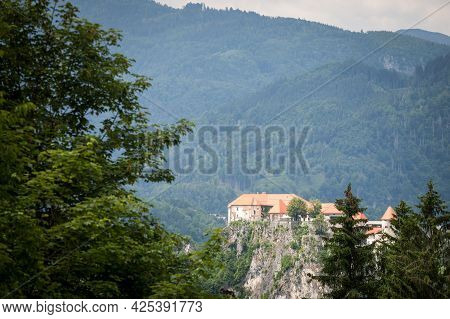 Selective Blur On The Bled Castle, Also Called Blejski Hrad, During Summer, Surrounded By The Trees 