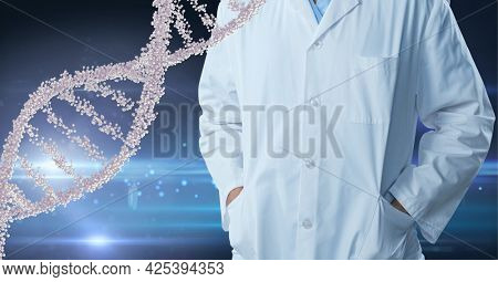 Mid section of male doctor against dna structure and spots of light on blue background. medical research and science technology concept