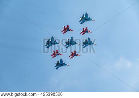 Moscow, Russia - May, 05, 2021: Diamond-shape Of 4 Mig-29 The Russian Knights And 5 Su-27 Swifts In 
