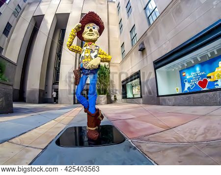 Life Size Woody Toy Model, Made Out Of Legos, Tilting His Hat At You, And Crossing His Leg Standing 