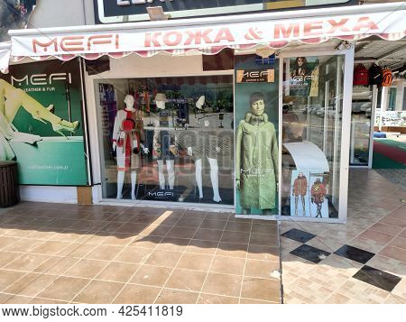 Beldibi, Kemer, Antalya, Turkey - May 11, 2021: Leather Jackets And Raincoats In A Clothes And Fur S