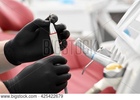 Dentists Office: Modern Equipment And Instruments. Treatment In A Dental Clinic. Close-up.