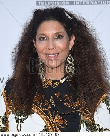 LOS ANGELES - JUN 04: Christine Devine arrives for the 2021 Race to Erase MS Drive-In on June 04, 2021 in Pasadena, CA