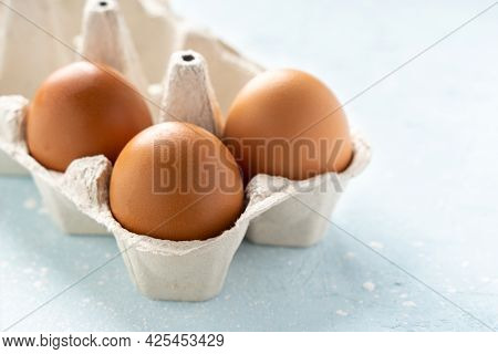 Eggs In Eco Package On Blue Cement Background.zero Waste Cconcept. Package-free Food Shopping. Side 