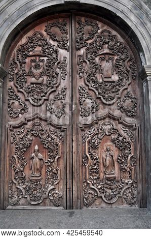 Antique Carving Wooden Door Window Of Convento De San Agustin Church Or Archdiocesan Shrine Of Nuest