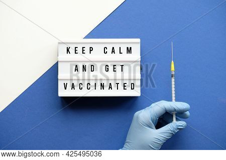 Vaccination Motivator Concept. Lightbox With Text Keep Kalm And Get Vaccinated. Medic Hand In Glove 