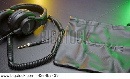 Russia, Moscow - May 5, 2021: New Headphones On Table. Action. New Model Of Headphones With Packagin