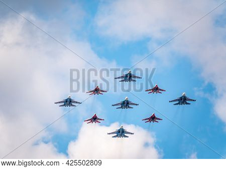 Moscow, Russia - May, 05, 2021: Diamond-shape Of 4 Mig-29 The Russian Knights And 5 Su-27 Swifts In 