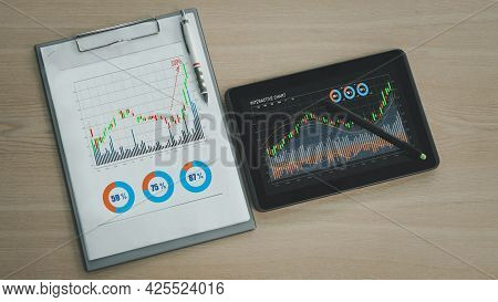 Preparing Report. Green And Red Graphs And Charts. Business Reports And Pile Of Documents On Ash Woo