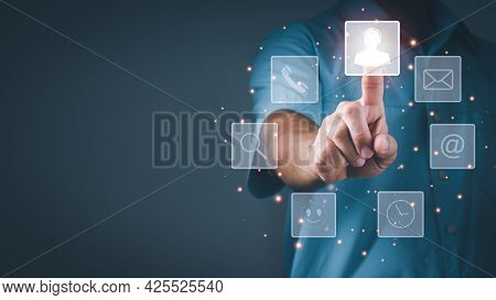 A Man Points To An Operator's Symbol, With Icons For After-sales Services. Communication Channel Of 