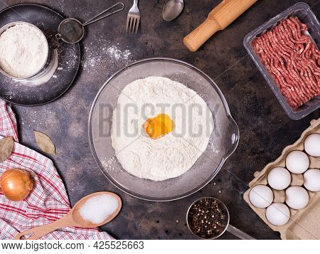 Ingredients For Maet Pies Or Dumplings On A Metal Tray