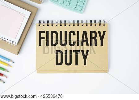 Paper With Text Fiduciary Duty On Wood Table.