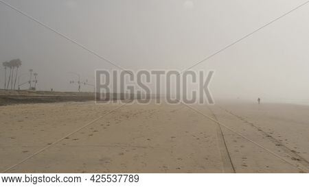 Sandy Misty Beach, Encinitas California Usa. Pacific Ocean Coast, Dense Fog Brume, Empty Sea Shore. 