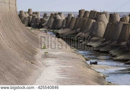 Dolos And Breakwater - Engineering Structures Protecting The Port Against Sea Waves