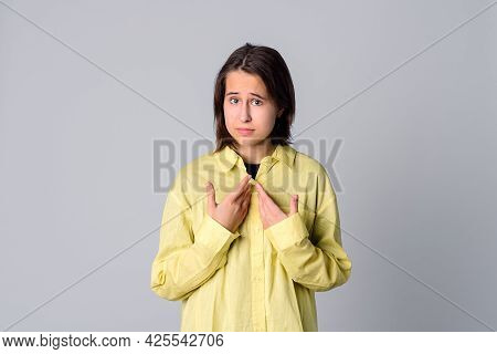 Shocked, Surprised Teen Girl Looking Asking Question, You Talking To Me, You Mean Me. Select Me Plea