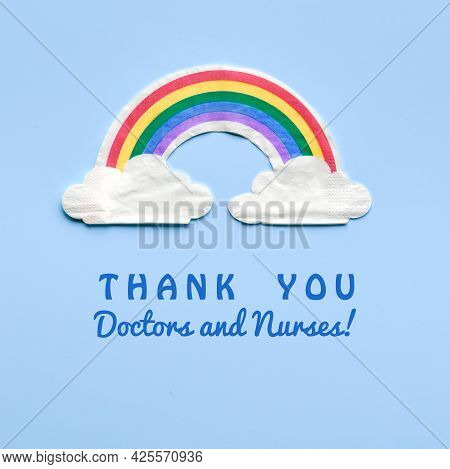 Rainbow With Clouds. Text Thank You Doctors And Nurses. Many Thanks To Nhs Fighting Pandemics. Motiv