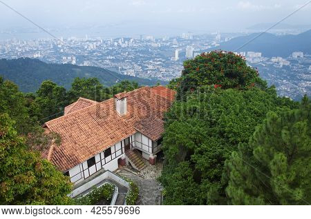 A Building On Top Of Penang Hill With The City Of Air Itam, Penang Malaysia In The Background.