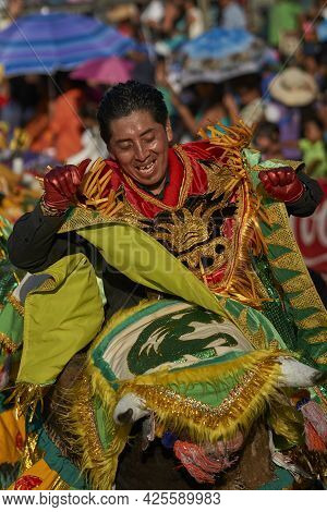 Arica, Chile - January 23, 2016: Members Of A Waca Waca Dance Group In Ornate Costume Performing At 