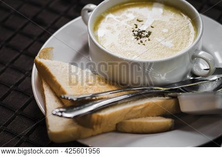 Cream Of Mushroom Soup With Garlic Bread For Bedfast Meal In Morning