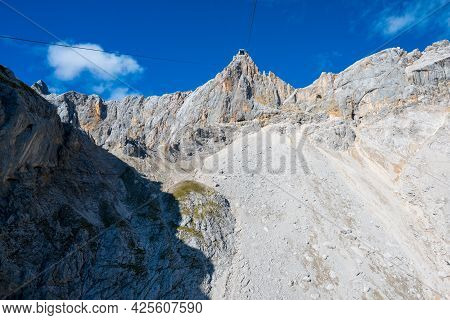 Low Angle Shot Of Cable Way Up To Hunerkogel In Austrian Alps, Right Next To Schladming Glacier And 