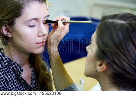 Kirov, Russia - November 09, 2019: Backstage Scene How Professional Make-up Artist Doing Glamour Mod