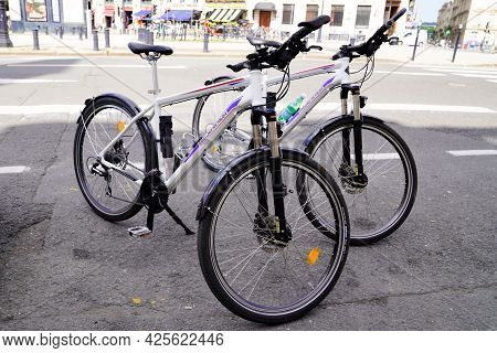 Sète , Ocitanie France  - 06 30 2021 : Police Bicycle Patrols In The Street Of The Town With Asvp Si