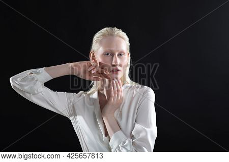 Young Blonde Albino Woman Doing Face Building Facial Gymnastics Self Massage And Rejuvenating Exerci