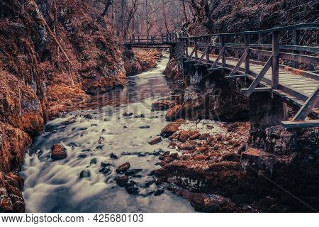 Landscape Of Old Wooden Bridge Over River In Mountains. Green Spring And Devil's Passage (zeleni Vir