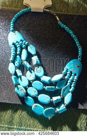 Beautiful Blue Beads. The Concept Of A Beautiful, Elegant Life And Beautiful Decoration For Woman