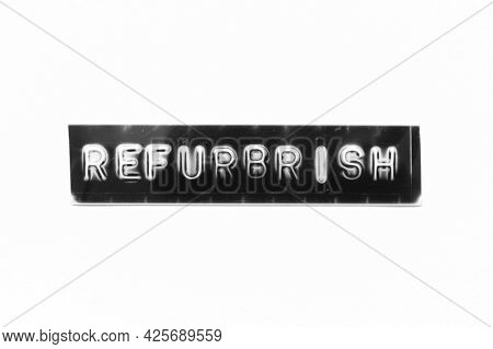 Embossed Letter With Word Refurbrish In Black Banner On White Paper Background